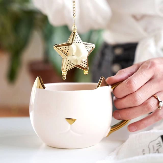 Infusor de té diseño estrella dorada